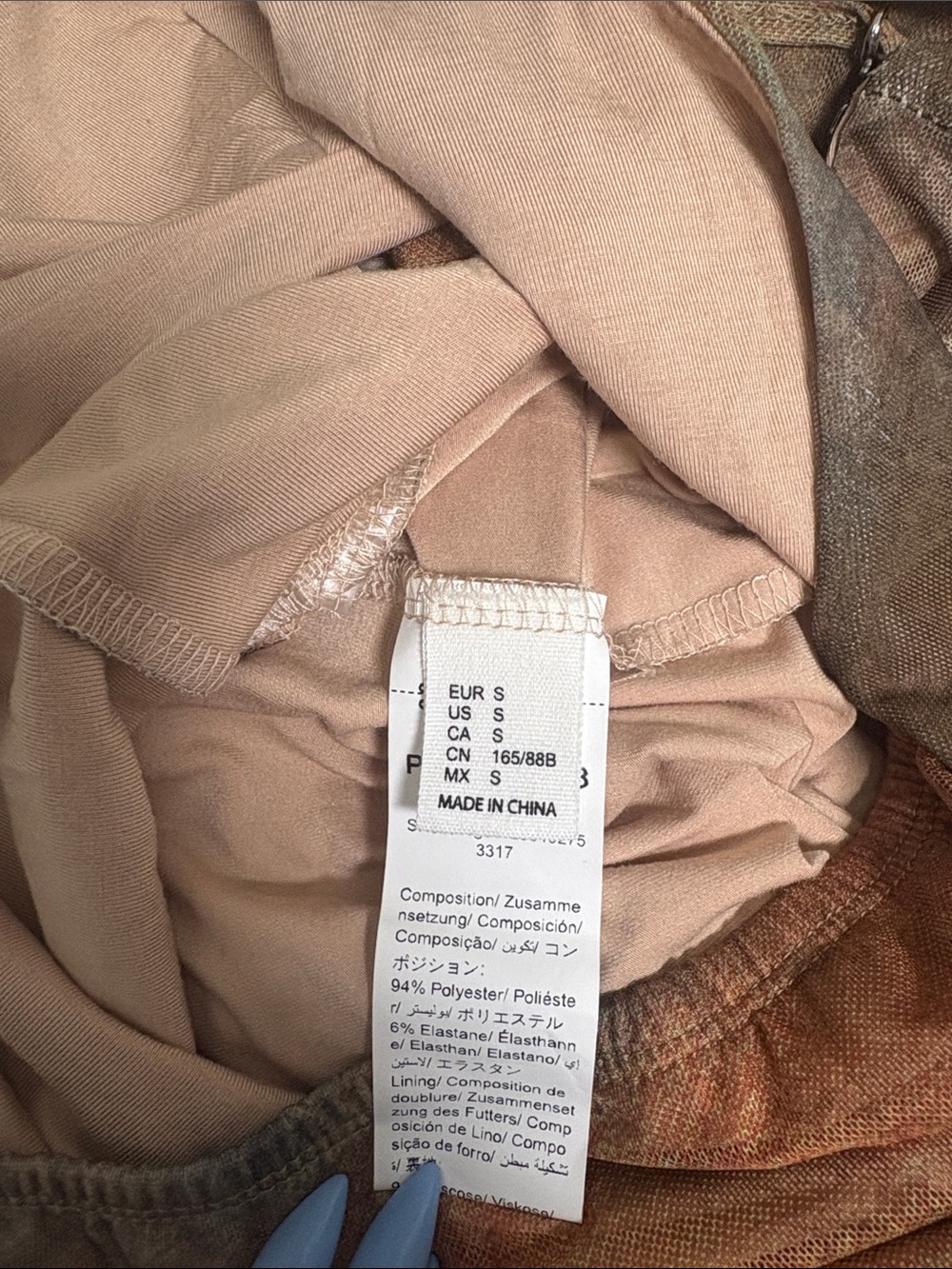 Sleeveless Plunge-Neck Tiered Mini Dress in Earth Tones - Picture 2 of 4